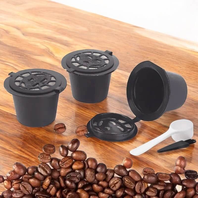 Reusable coffee capsules with a brush and spoon